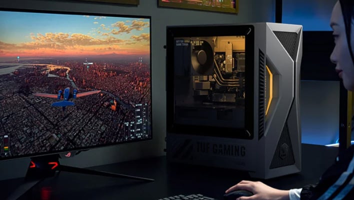ASUS TUF Gaming T500 PC next to a monitor.