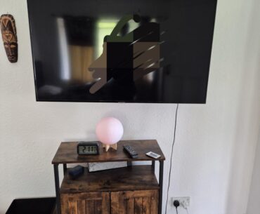 How can I make room for a small desk and 27 inch gaming monitor?
