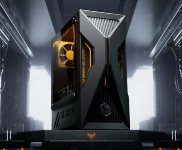 ASUS TUF Gaming T500 desktop (render) on a pedestal in what looks like the cargo bay of a spaceship.