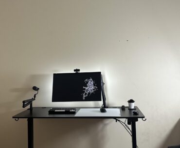 new black standing desk productivity setup