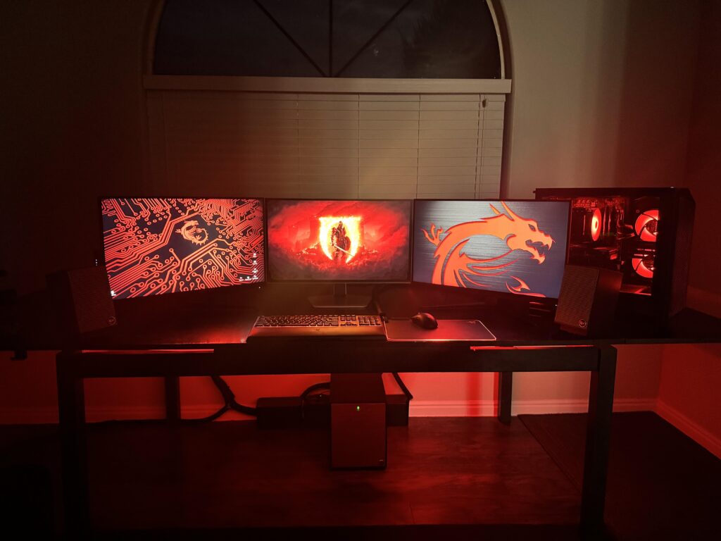 Just added Samsung g60sd oled (middle display, and red led strip under desk.