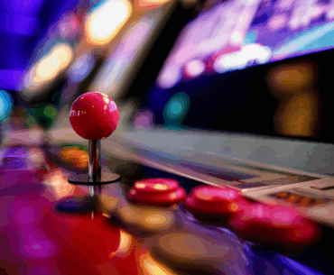 close up of joystick and buttons on arcade game