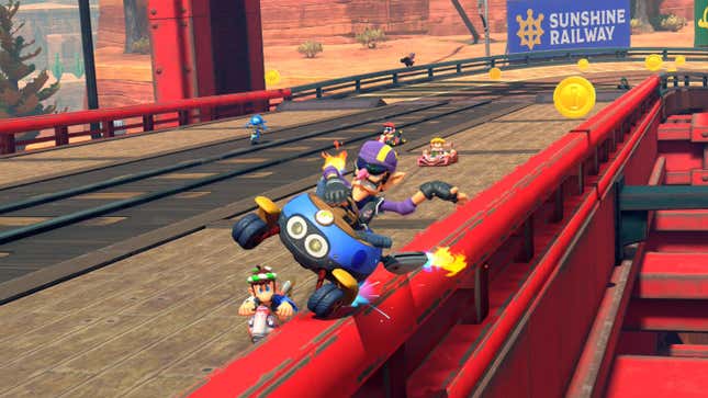 Waluigi rail rides on a bridge in front of other racers.