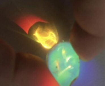 Innovating futuristic art and design using a crystal and light creatively with a PC. Mutant artist with visual snow syndrome.
