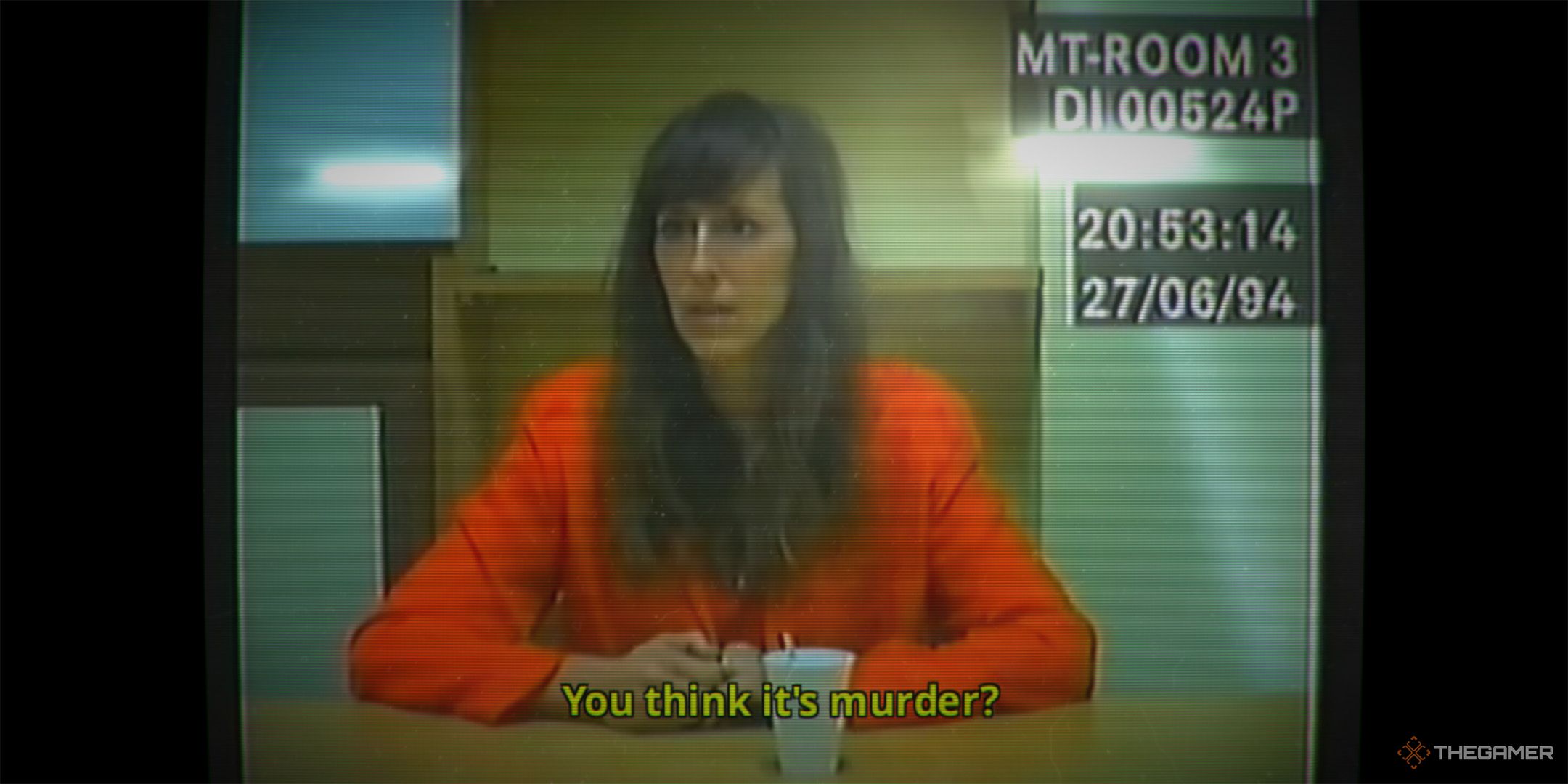 A screenshot of Her Story, in which Hannah sits in an interrogation room.
