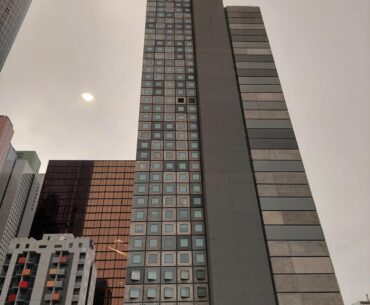 The sky outside my cube was the color of television, tuned to a dead channel.