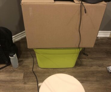 1200 dollar laptop on a 20 dollar cardboard box