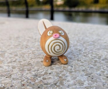 I carved a Poliwag out of maple wood with custom brass inlays! [OC]