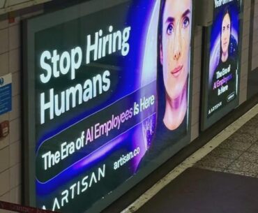Ads telling people to "stop hiring humans" in london underground