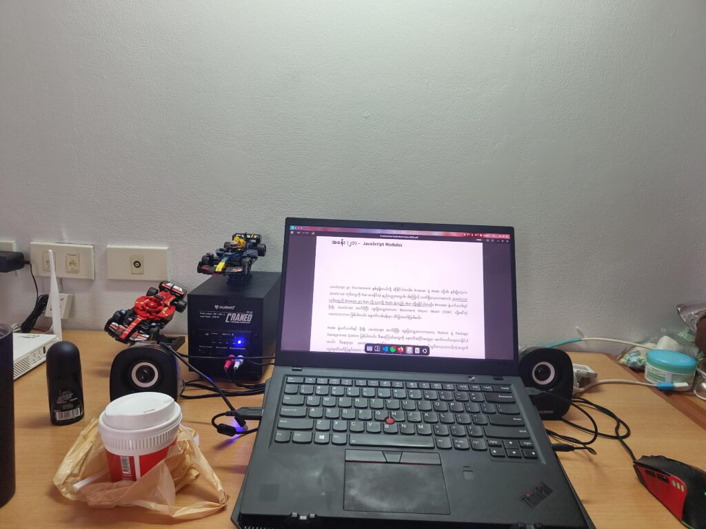 ICT student's battlestation with shitty speakers, mouse. Excuse the coffee cup.