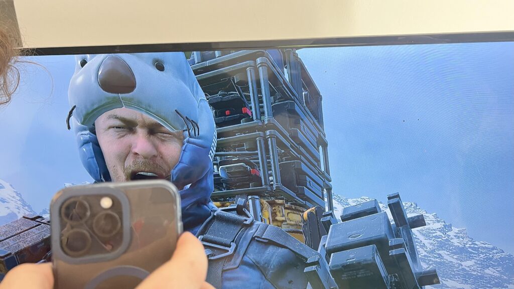 People in the UK are using Norman Reedus' highly detailed face from Death Stranding to get past newly imposed age restrictions - opening the photo mode of Death Stranding 2, pointing at Sam's face, and use the expression options to complete face recognition