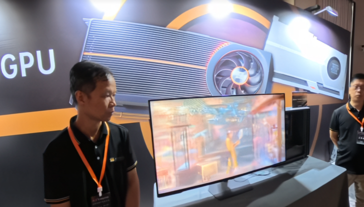 China Launches Its First 6nm GPUs For Gaming & AI, the Lisuan 7G106 12 GB & 7G105 24 GB, Up To 24 TFLOPs, Faster Than RTX 4060 In Synthetic Benchmarks & Even Runs Black Myth Wukong at 4K High With Playable FPS Expo booth with GPU display, screen showing graphics, and two attendees with lanyards.