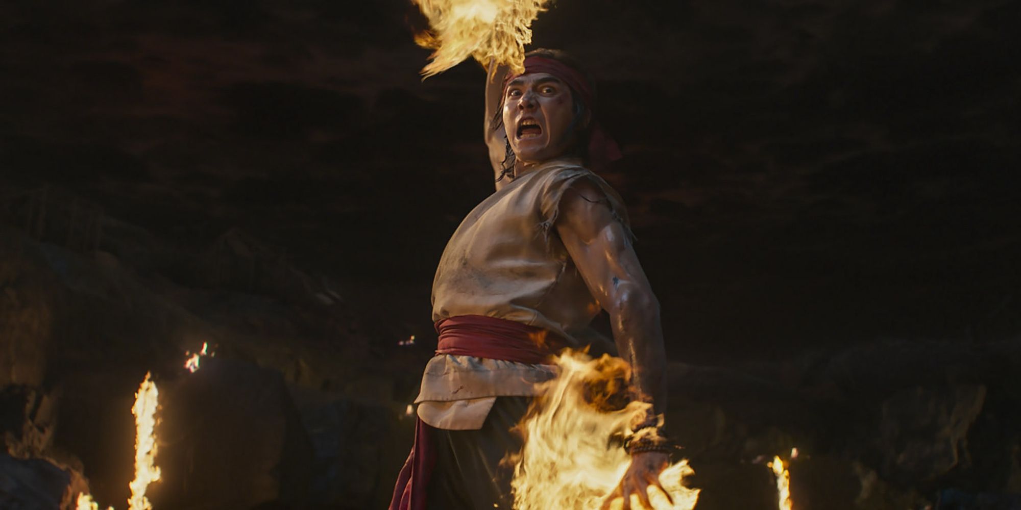 Liu Kang with flames coming out of his hands in Mortal Kombat (2021)