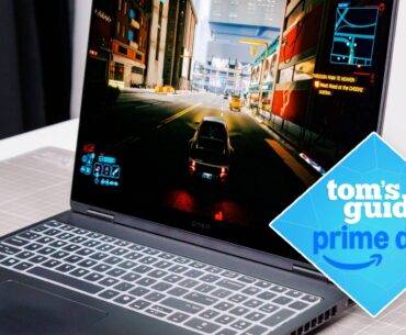 HP Omen Max 16 side view on table with Cyberpunk 2077 on display with Tom's Guide Prime Day badge