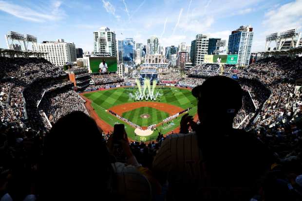 Fans cheer on the Padres before their game against the Atlanta Braves during Opening Day of the 2025 season at Petco Park on Thursday, March 27, 2025 in San Diego, CA. (Meg McLaughlin / The San Diego Union-Tribune)