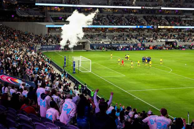 Fans celebrate after a San Diego Wave FC goal against the Utah Royals during their match at Snapdragon Stadium on Saturday, March 22, 2025 in San Diego, CA. (Meg McLaughlin / The San Diego Union-Tribune)