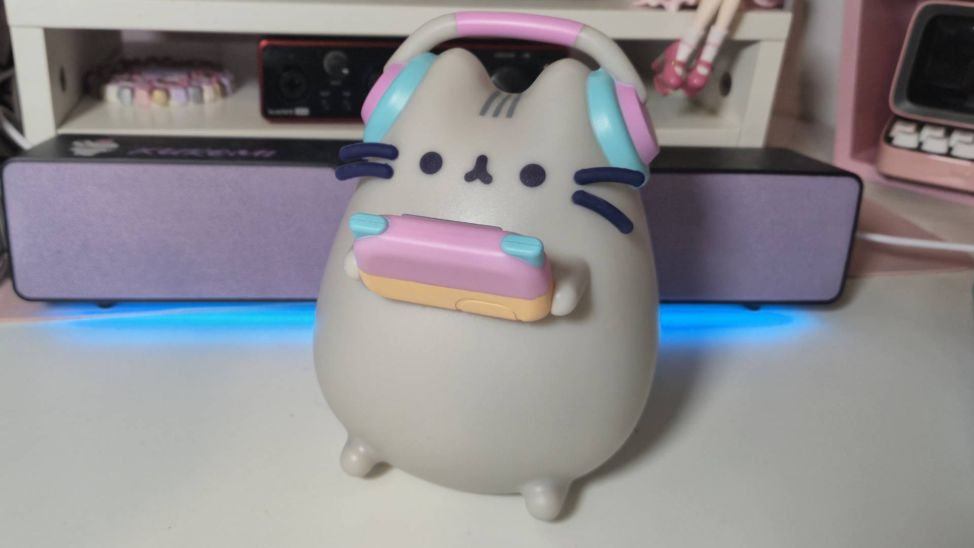 Please send help, I treated myself to his Pusheen gaming lamp for under $30 and now I want the entire collection Photo by Rosalie Newcombe of the official Pusheen gamer lamp sitting on a white desk.