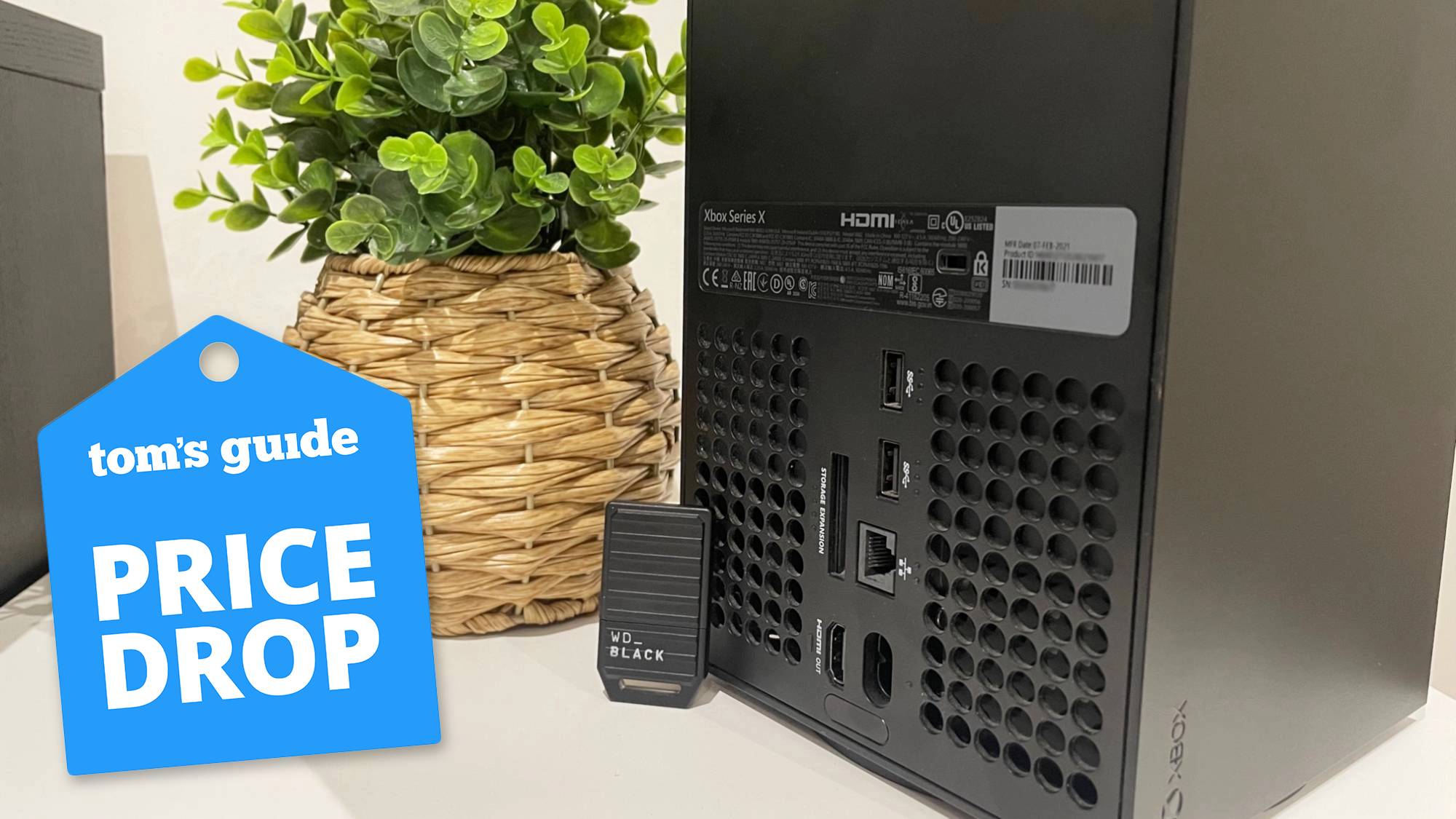 WD_Black C50 Expansion Card next to an Xbox Series X console