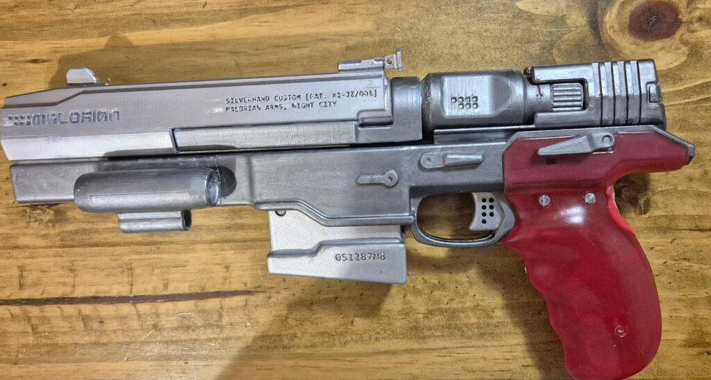 3D printed replica of Johnny's Malorian Arms 3516