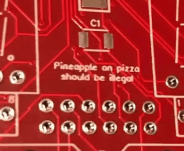 A designer or engineer left this very important message on their sold circuit boards