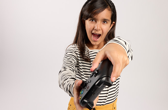 girl playing video game