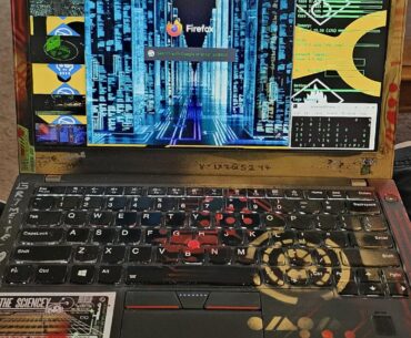 Tinkering wirh theThinkpad X240 running Debian XFCE. I got a little script together that opens 5 cyberpunk movie favorites on the left of the screen. The audio can be toggled between them with super + A.