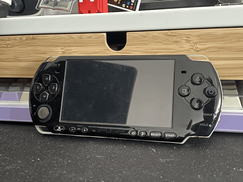Found my old PSP from 2013. Battery and charger are long gone, but I can't wait to replace them and dive back into my old Monster Hunter save file!