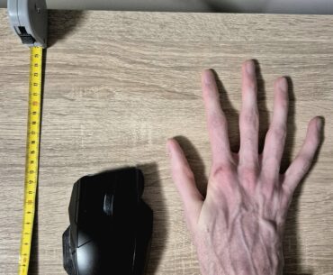 My 25cm Slenderman appendage next to the biggest gaming mouse - I need recommendations for a trackball with MacOS driver support.
