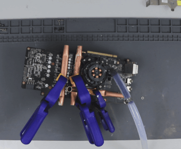 GTX 1060 pushed to 2200MHz with nothing but copper pipes, a Bunnings run, and curve editor on a shed "battlestation"