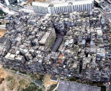 Kowloon Walled City - "The densest city on earth" - no laws and no addresses