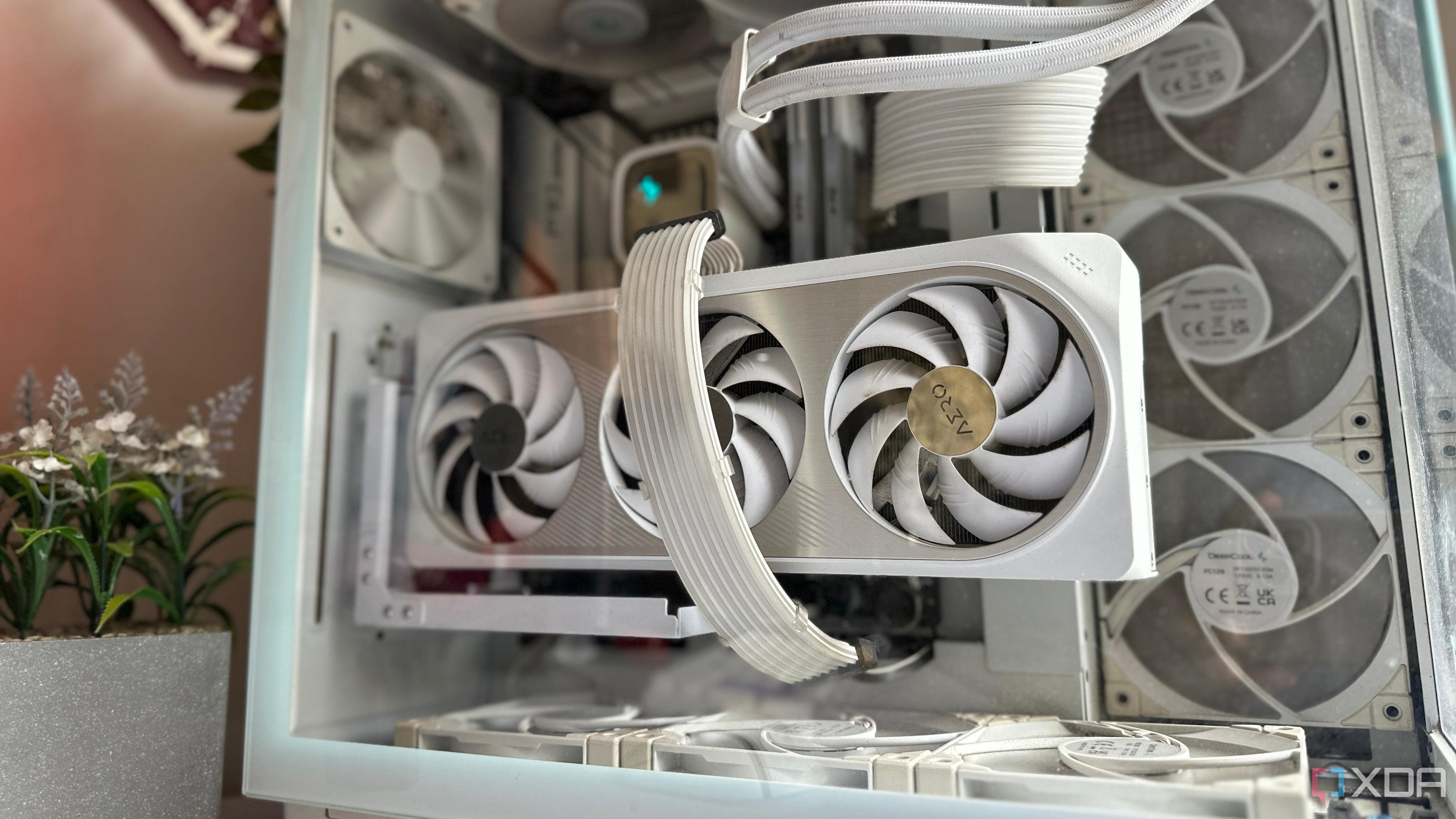 A white gaming PC with a white GPU in focus