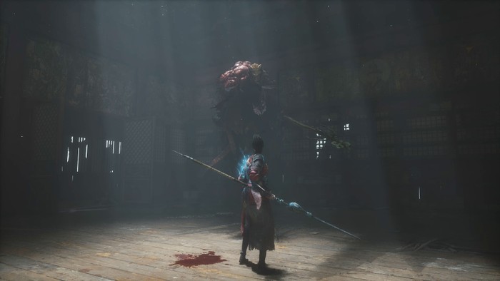 Bai Wuchang wielding a spear in front of a floating boss lit by a skylight in Wuchang: Fallen Feathers.