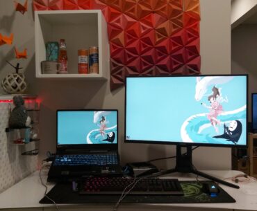 Standing desk, laptop, and origami that I did