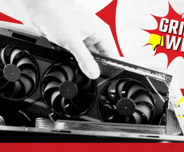 A hand attempting to install a graphics card that's too big for the PC case.