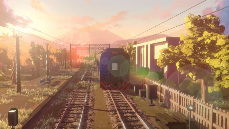 A train travels down sunlit tracks lined with trees and buildings, bathed in a warm, golden glow at sunset. Lens flare and long shadows create a peaceful, scenic atmosphere.