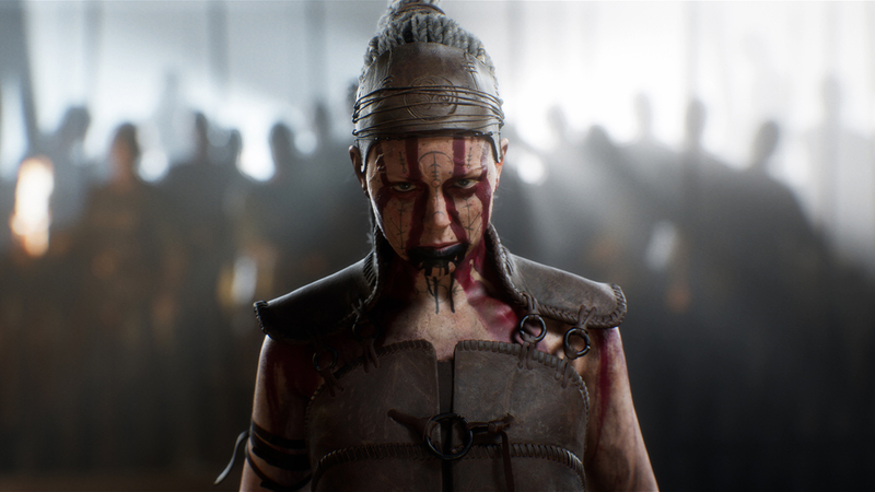 Senua form hellblade staring straight ahead with people in a blurry background