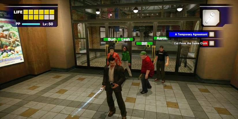 Frank West escorting survivors in Dead Rising