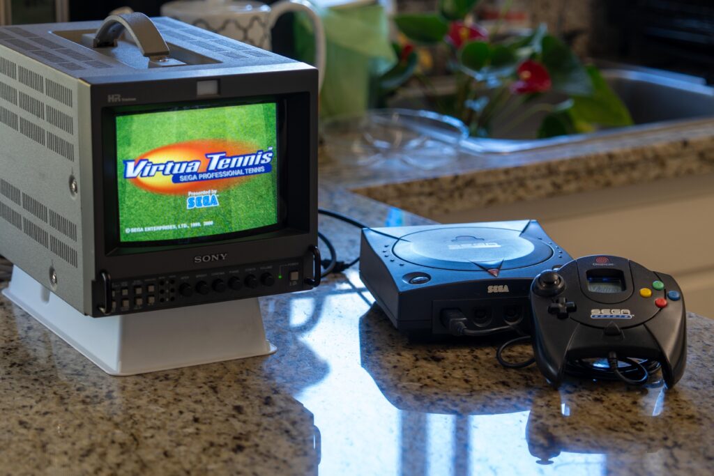 Very psyched about my recent yard sale purchase: a lovely black "Sega Sports" edition Dreamcast! It's in great shape overall and the previous owner even installed a nice DreamPSU after the original power supply died. Looks fantastic connected to my Sony PVM-8045Q via RetroTINK Component cables