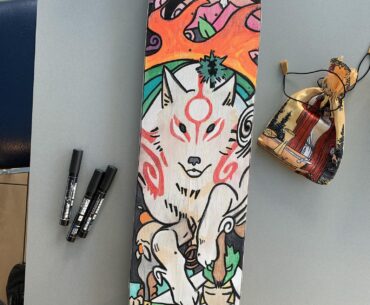 I hand-painted a skateboard deck with POSCA pens.