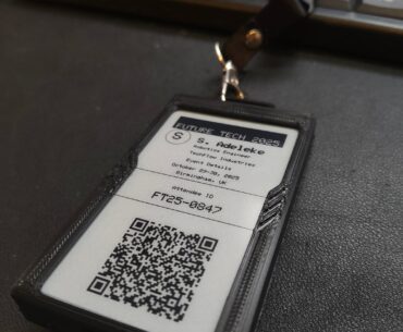 an e-ink conference badge i made w/ NFC to share my portfolio