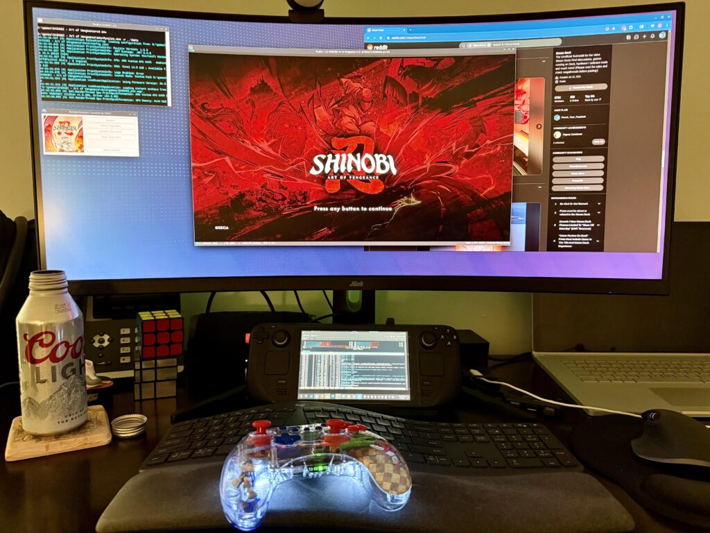 My new Steam Deck battlestation, with a controller my daughter gave me as a gift.