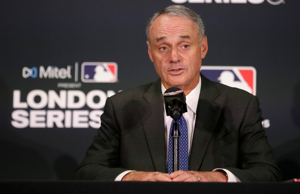 Major League Baseball commissioner Rob Manfred speaks during a news conference, June 29, 2019, in London. 