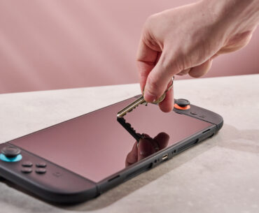 Pushing key against the DBrand Prism 2.0 for Nintendo Switch 2