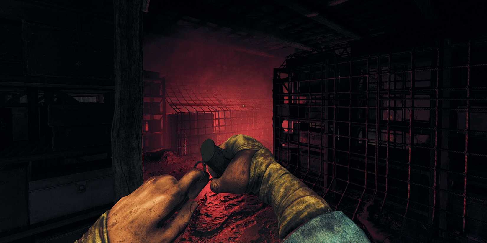 Amnesia: The Bunker's protagonist holding a grenade.