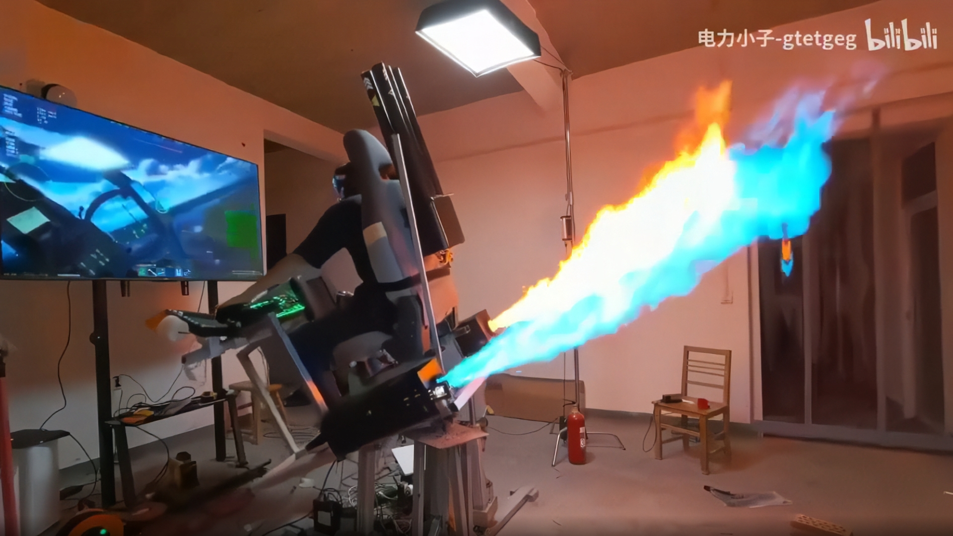 Legendary combat sim enthusiast builds frankly dangerous fighter jet rig — features three-axis motion seat, a cannon, afterburners, and a chaff launcher jet cockpit spewing flames out of its afterburners