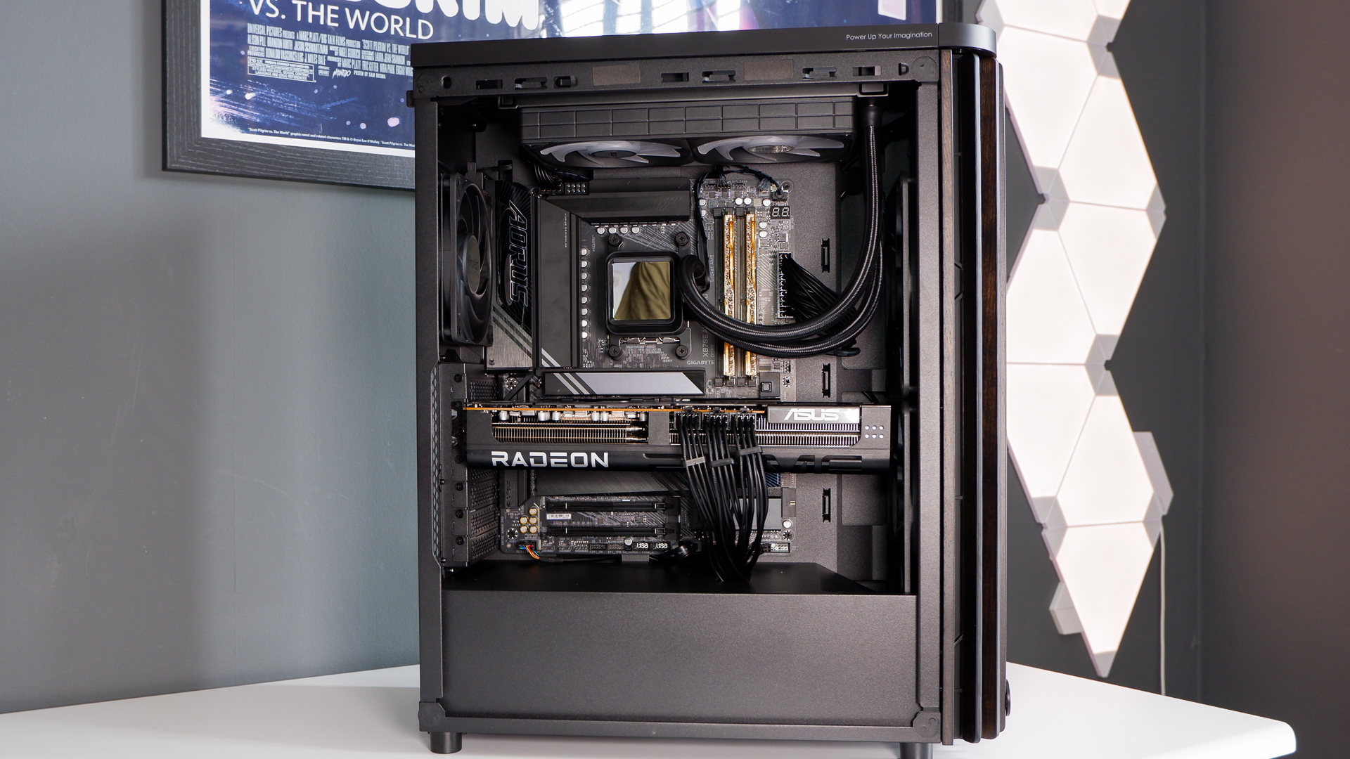 A gaming PC in the process of being built, using Radeon and Ryzen components and an Asus Pro Art PA401 PC case.