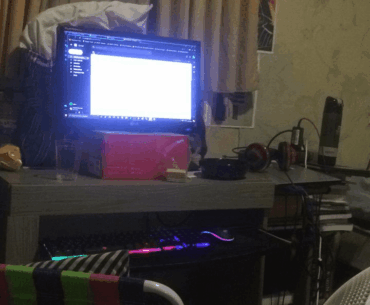 my awesome setup in 2020 pandemic, used it for a year and a half, great memories though. (yes, the pillow was to support the monitor, and the fan was to avoid the laptop from getting hot and turning off in 20 minutes.)