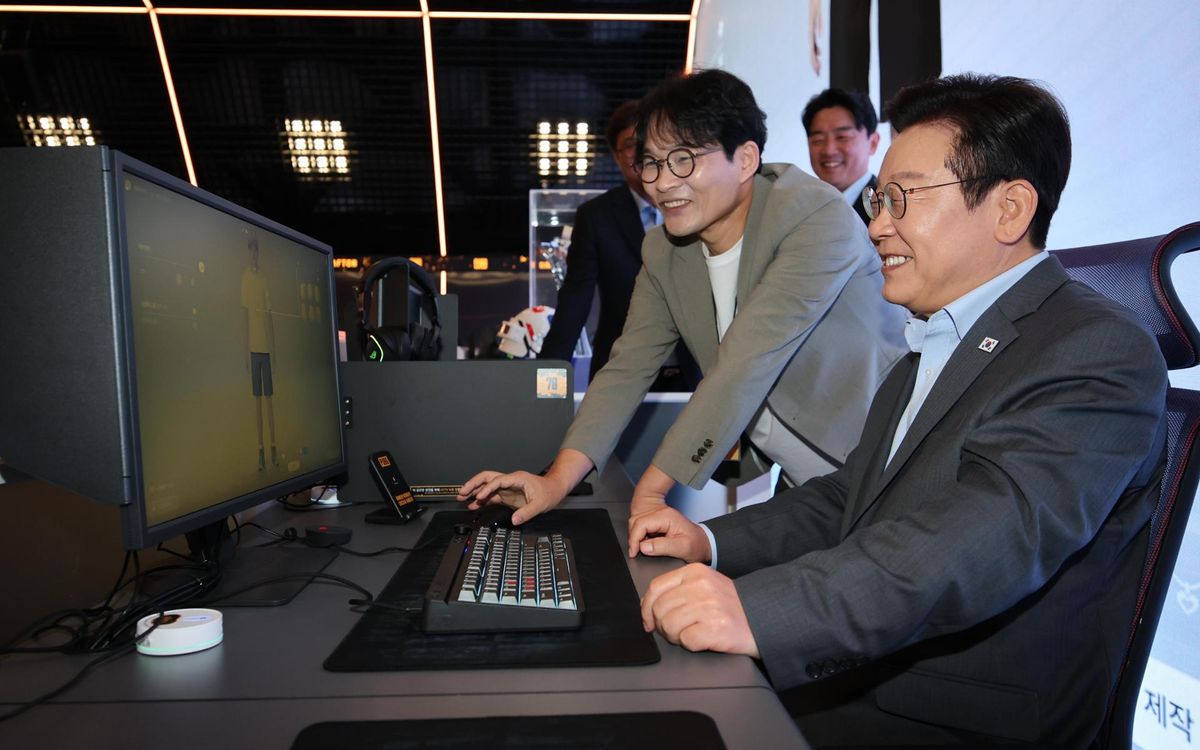 President Lee Jae Myung tries out inZOI, an AI-based life simulation game, at PUBG Seongsu, the game and cultural space operated by Korean game company Krafton in Seoul, Wednesday. Joint Press Corps