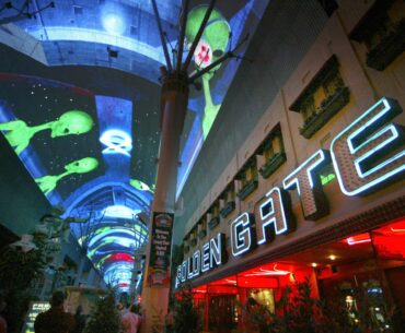 The historic Golden Gate Hotel and Casino (right) dates from 1906, while the Fremont Street Experience hovering above it is an addition to downtown from the 1990s. (Photo by cdm) 2005