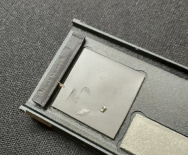 This capacitor/resistor thing fell off my SSD after removing it from its enclosure, I can still access the data but will it be ok?
